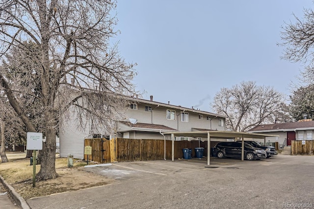 exterior space with a carport