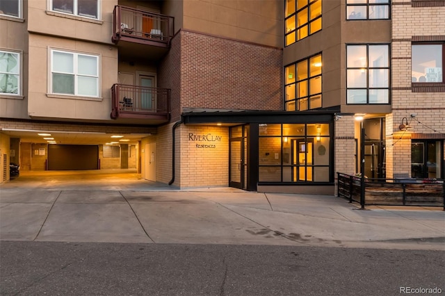 2240 N Clay St Unit 309, Denver, CO 80211 - property entrance with brick siding and concrete driveway
