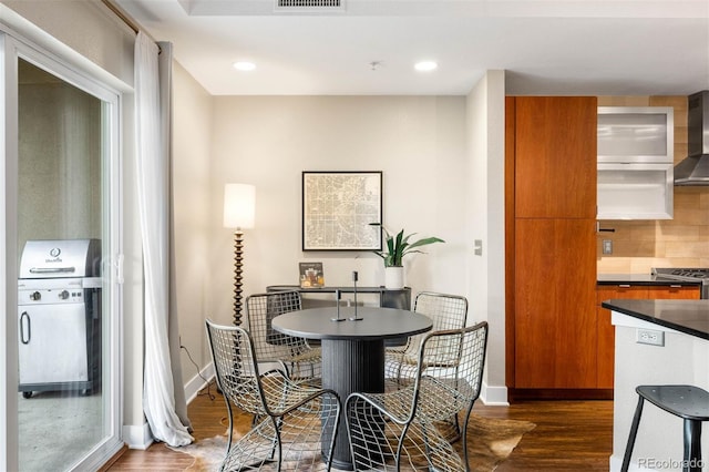 2240 N Clay St Unit 309, Denver, CO 80211 - dining space with dark wood-type flooring and recessed lighting