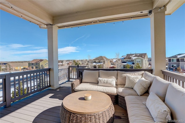 deck featuring a residential view and outdoor lounge area