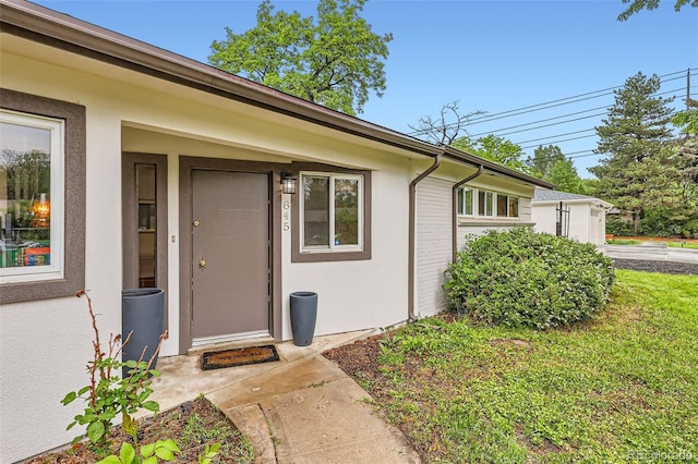 845 Everett St, Lakewood, CO 80215 - entrance to property featuring stucco siding and a yard
