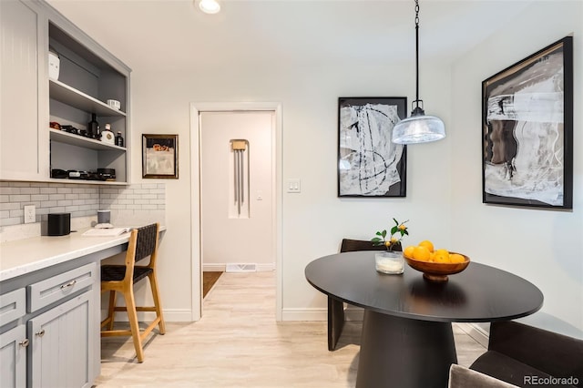 845 Everett St, Lakewood, CO 80215 - dining area featuring light wood-style floors, baseboards, and recessed lighting