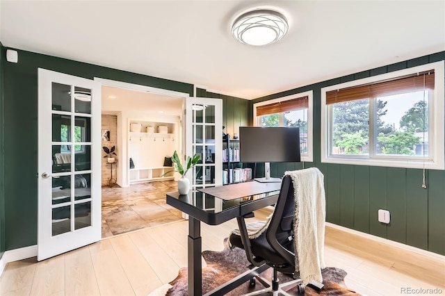 845 Everett St, Lakewood, CO 80215 - office area featuring french doors, wood finished floors, and baseboards