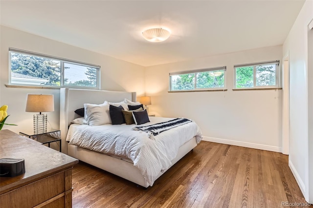 845 Everett St, Lakewood, CO 80215 - bedroom with wood finished floors and baseboards