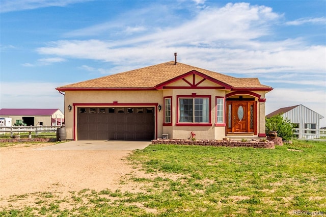 46303 E 106th Ave, Bennett, CO 80102 - view of front of property featuring driveway, stucco siding, and an attached garage