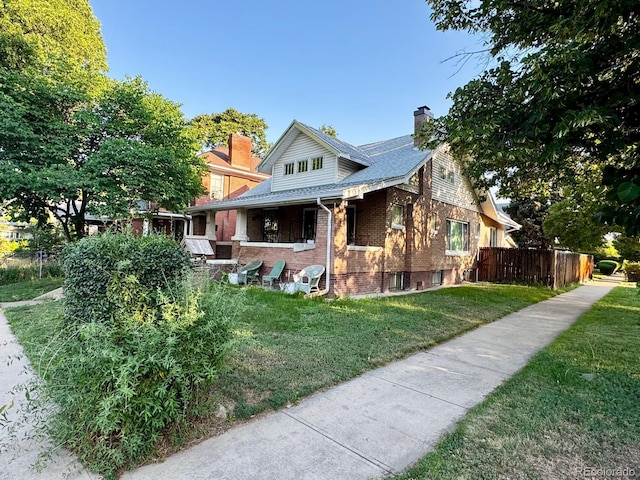 1731 E 25th Ave, Denver, CO 80205 - bungalow-style house with a chimney and brick siding