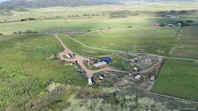 26000 Wheeler Creek Ln, Steamboat Springs, CO 80487 - aerial view of property and surrounding area with rural landscape and a mountainous background
