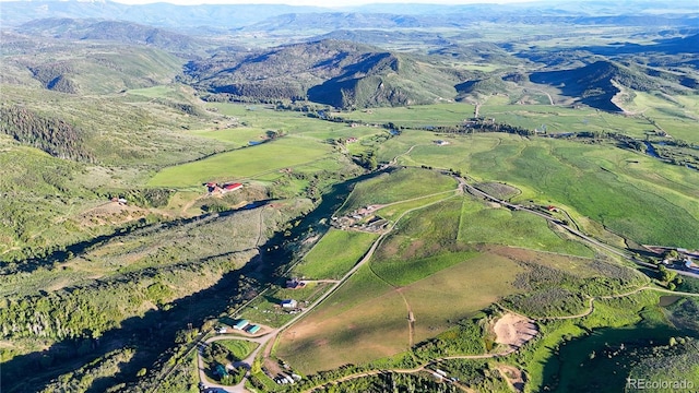 26000 Wheeler Creek Ln, Steamboat Springs, CO 80487 - aerial overview of property's location featuring a mountain backdrop