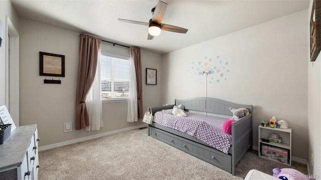 carpeted bedroom featuring ceiling fan