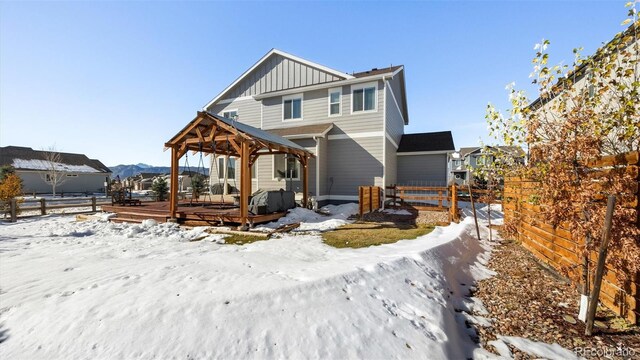 view of front of home with a deck