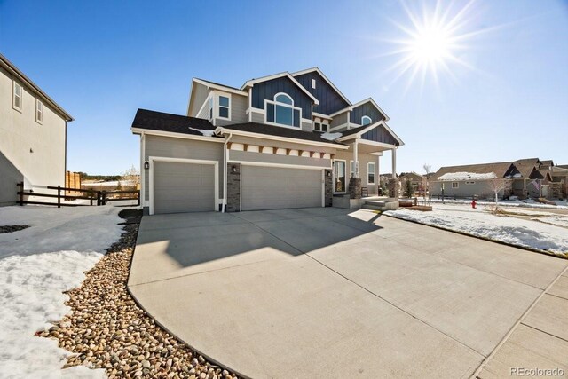 craftsman-style home with a garage