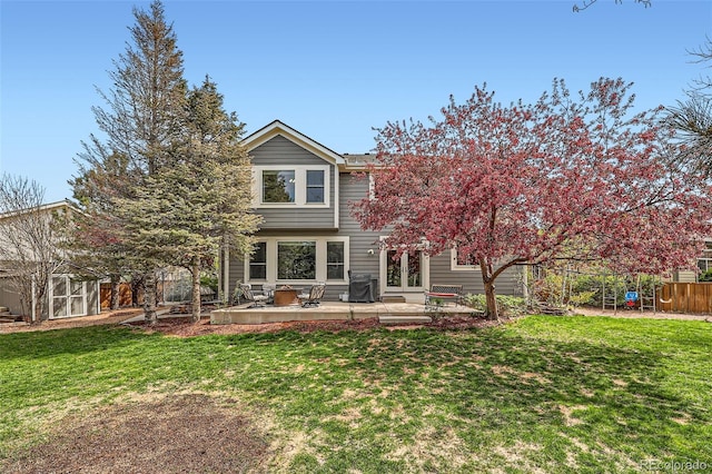 11321 Mesa Verde Pl, Parker, CO 80138 - back of house with french doors and a patio area