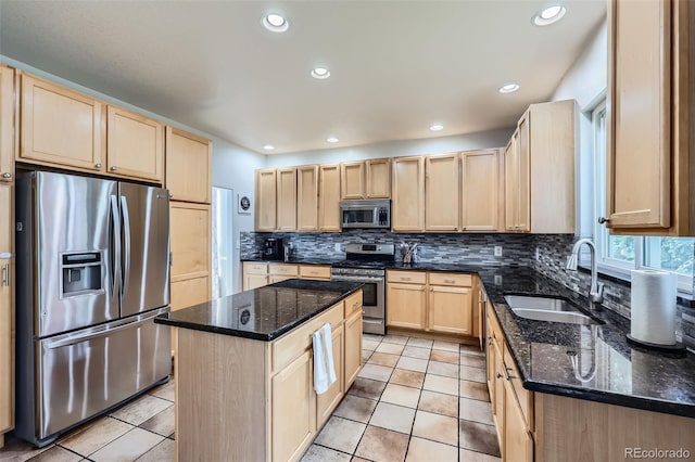 11321 Mesa Verde Pl, Parker, CO 80138 - kitchen featuring stainless steel appliances, light brown cabinets, a sink, a center island, and decorative backsplash