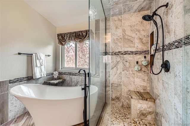 11321 Mesa Verde Pl, Parker, CO 80138 - bathroom with tiled shower and a freestanding bath
