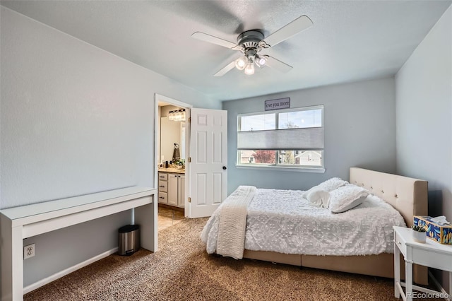 11321 Mesa Verde Pl, Parker, CO 80138 - bedroom featuring carpet floors, connected bathroom, ceiling fan, and baseboards