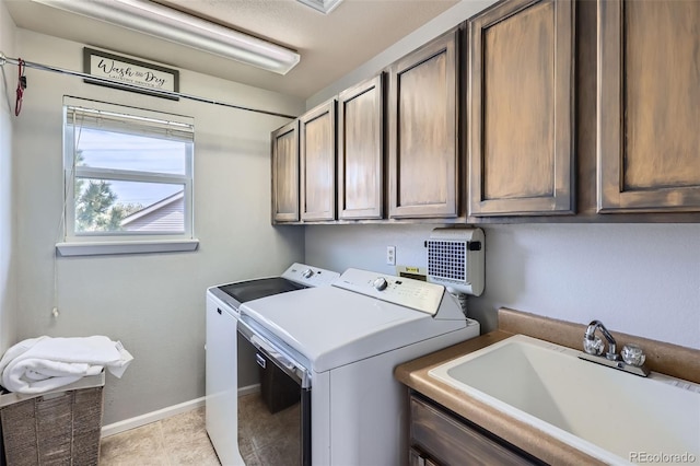 11321 Mesa Verde Pl, Parker, CO 80138 - laundry area with cabinet space, washing machine and clothes dryer, and baseboards