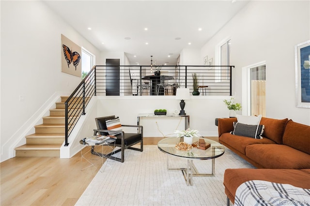 3295 Lawrence St, Denver, CO 80205 - living room featuring wood finished floors and recessed lighting