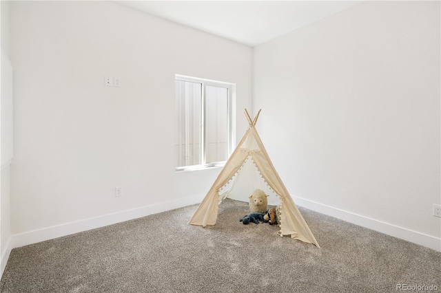 3295 Lawrence St, Denver, CO 80205 - recreation room featuring carpet floors and baseboards
