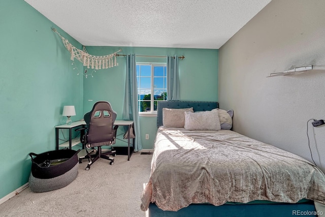 3730 Hazelwood Ct, Colorado Springs, CO 80918 - carpeted bedroom with a textured ceiling and an office area