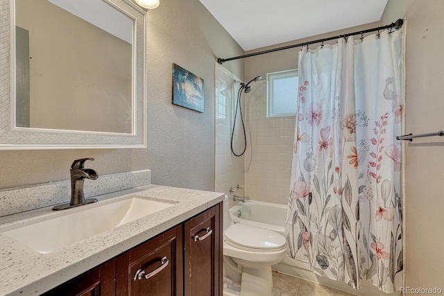 3730 Hazelwood Ct, Colorado Springs, CO 80918 - full bathroom with vanity, shower / bath combination with curtain, a textured wall, and tile patterned floors