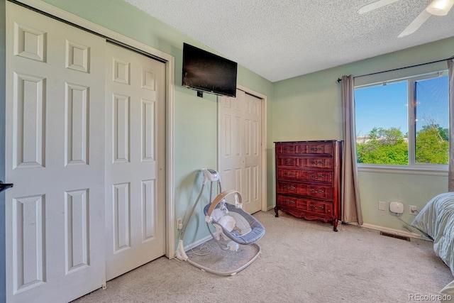 3730 Hazelwood Ct, Colorado Springs, CO 80918 - carpeted bedroom featuring a textured ceiling and a ceiling fan