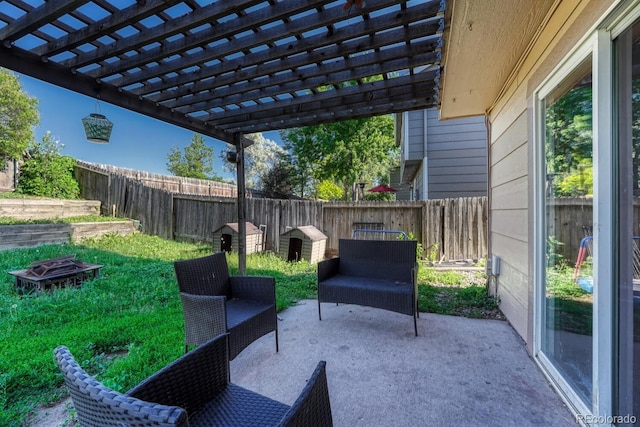 3730 Hazelwood Ct, Colorado Springs, CO 80918 - fenced backyard with a fire pit, a pergola, and a patio area