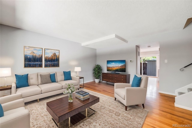 living room featuring light wood-type flooring