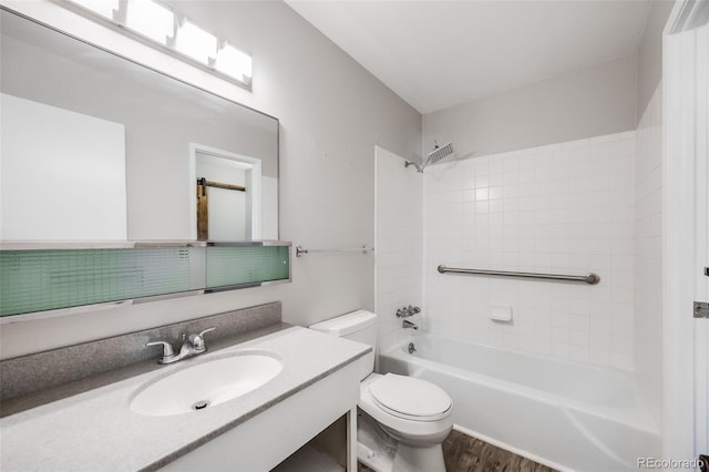 full bathroom with toilet, vanity, and  shower combination