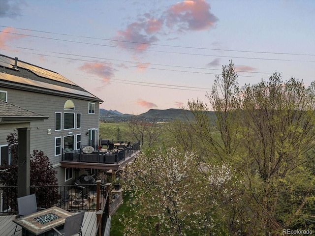 828 Rabbit Run Dr, Golden, CO 80401 - yard at dusk featuring a fire pit and a deck with mountain view