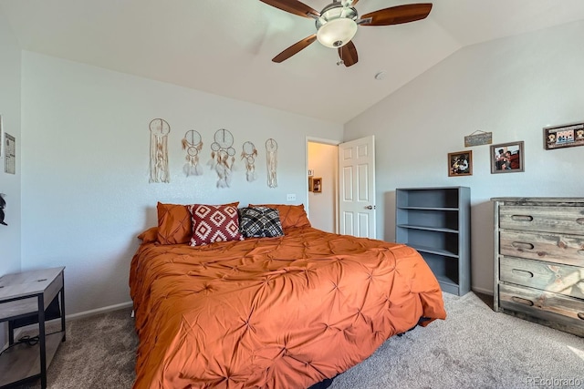 bedroom with dark colored carpet, vaulted ceiling, and ceiling fan