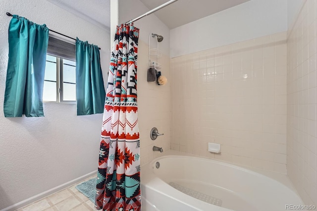 bathroom featuring shower / bathtub combination with curtain