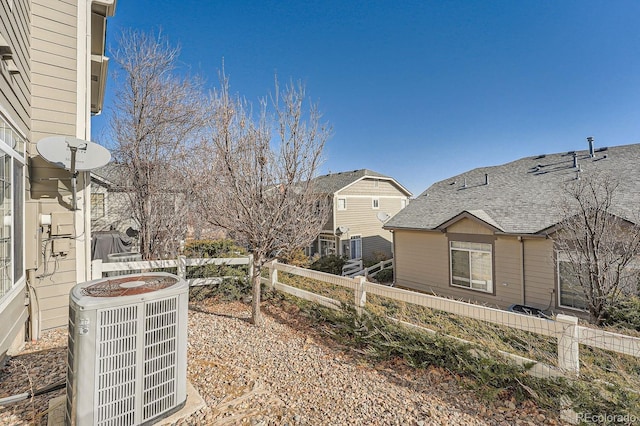 view of yard with central AC