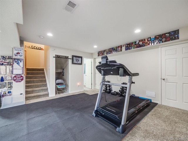 exercise area featuring dark carpet, recessed lighting, and baseboards