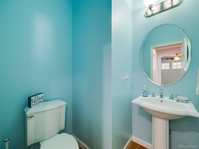 20592 E Lake Ave, Centennial, CO 80016 - bathroom featuring toilet and wood finished floors