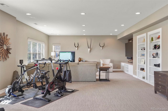 workout room featuring recessed lighting, baseboards, visible vents, and light colored carpet