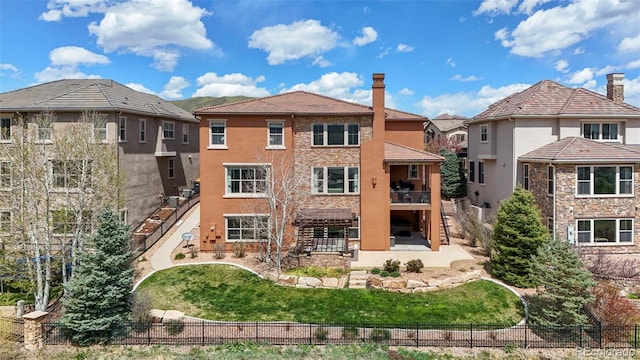 back of property featuring stairway, a patio, fence, and stucco siding