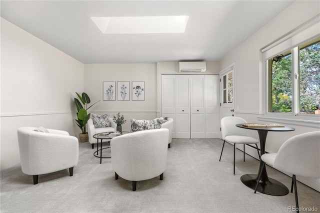 living area with an AC wall unit, carpet flooring, and a skylight
