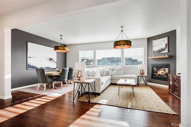 living room with dark hardwood / wood-style flooring