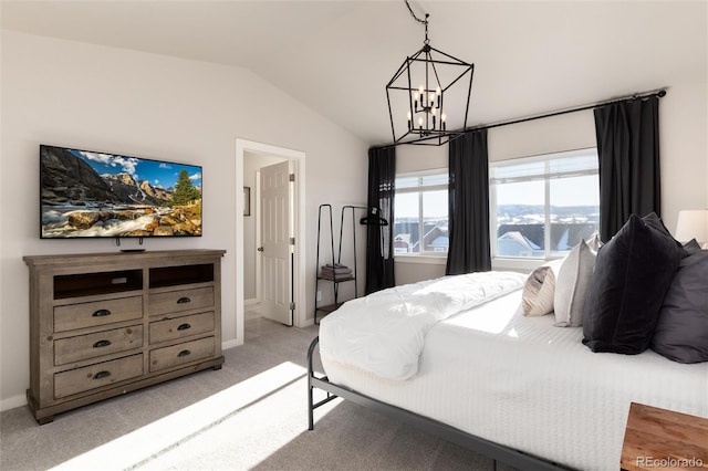 bedroom featuring lofted ceiling, light colored carpet, and a chandelier