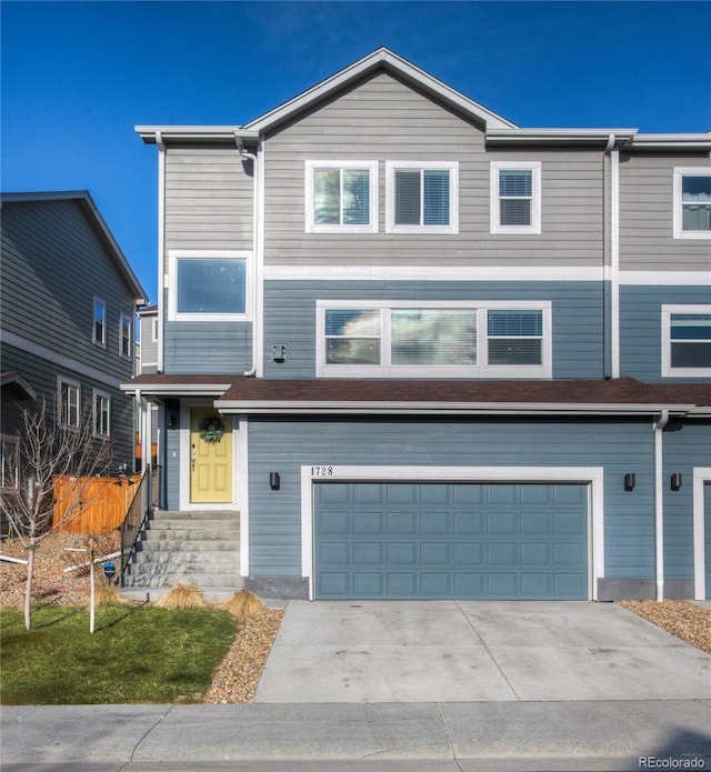 view of front of home with a garage