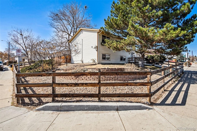 exterior space featuring a fenced front yard