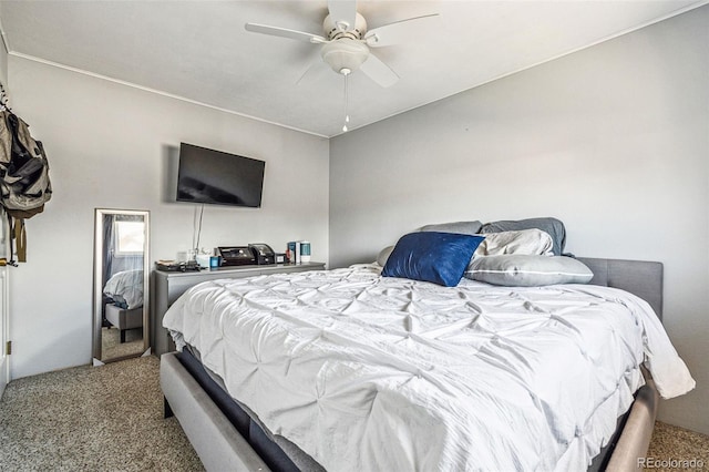 carpeted bedroom featuring a ceiling fan