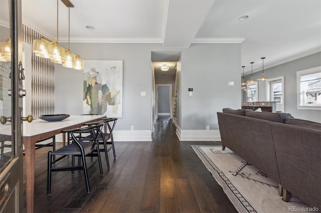 1626 Albion St, Denver, CO 80220 - dining room featuring dark wood-style floors, baseboards, and ornamental molding