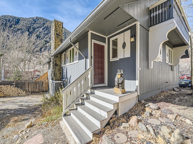 doorway to property with a mountain view