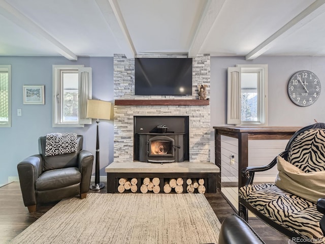 sitting room with dark hardwood / wood-style floors and beam ceiling