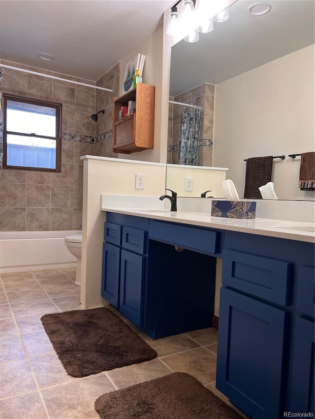 full bathroom featuring toilet, shower / bath combination with curtain, tile patterned flooring, and vanity