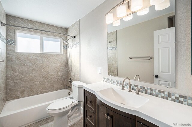 bathroom with toilet, shower / tub combination, decorative backsplash, and vanity