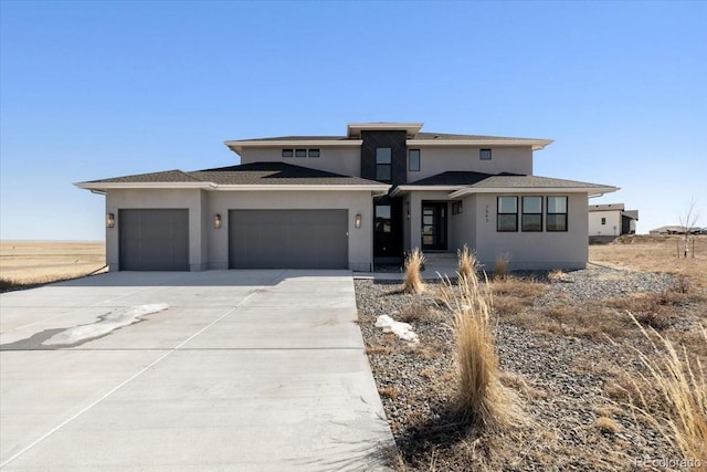 prairie-style home with a garage