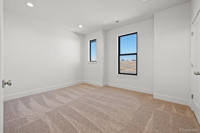 empty room with carpet floors