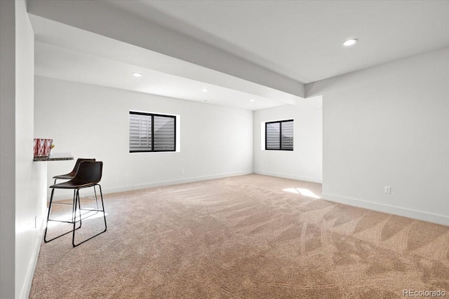 empty room with light colored carpet